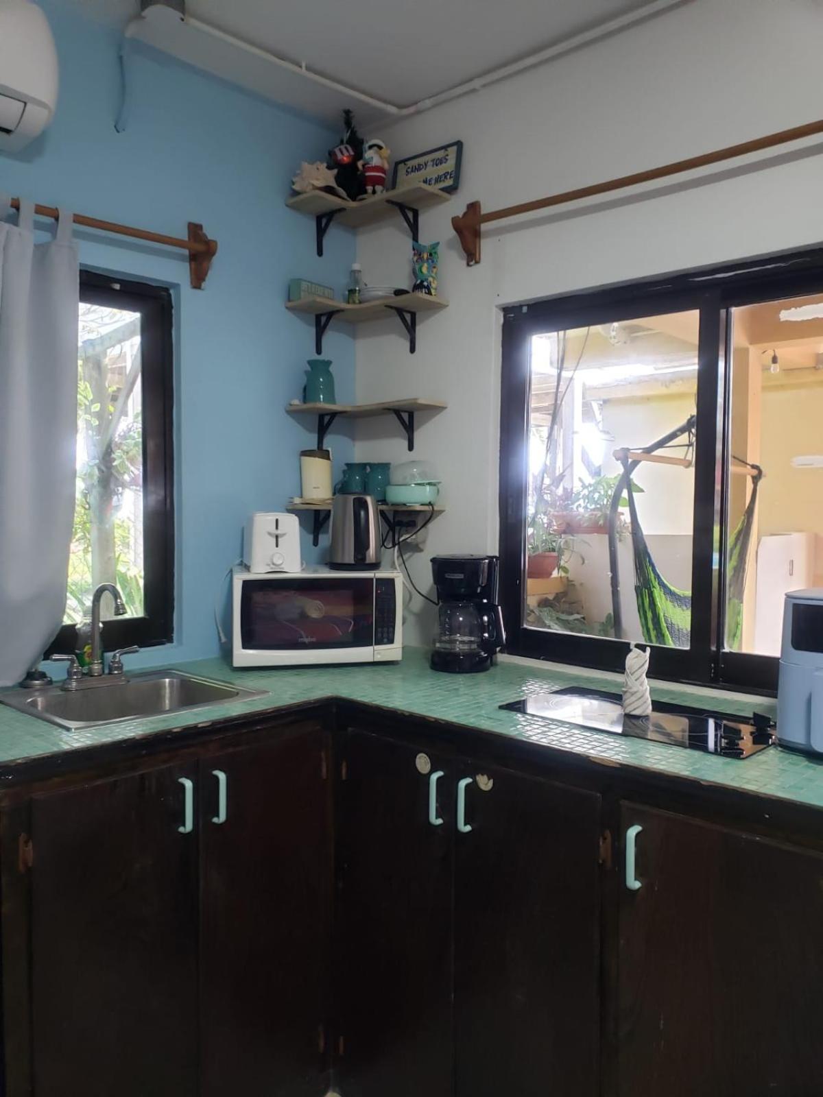Beach Club Condos At Popeyes Caye Caulker Exterior foto